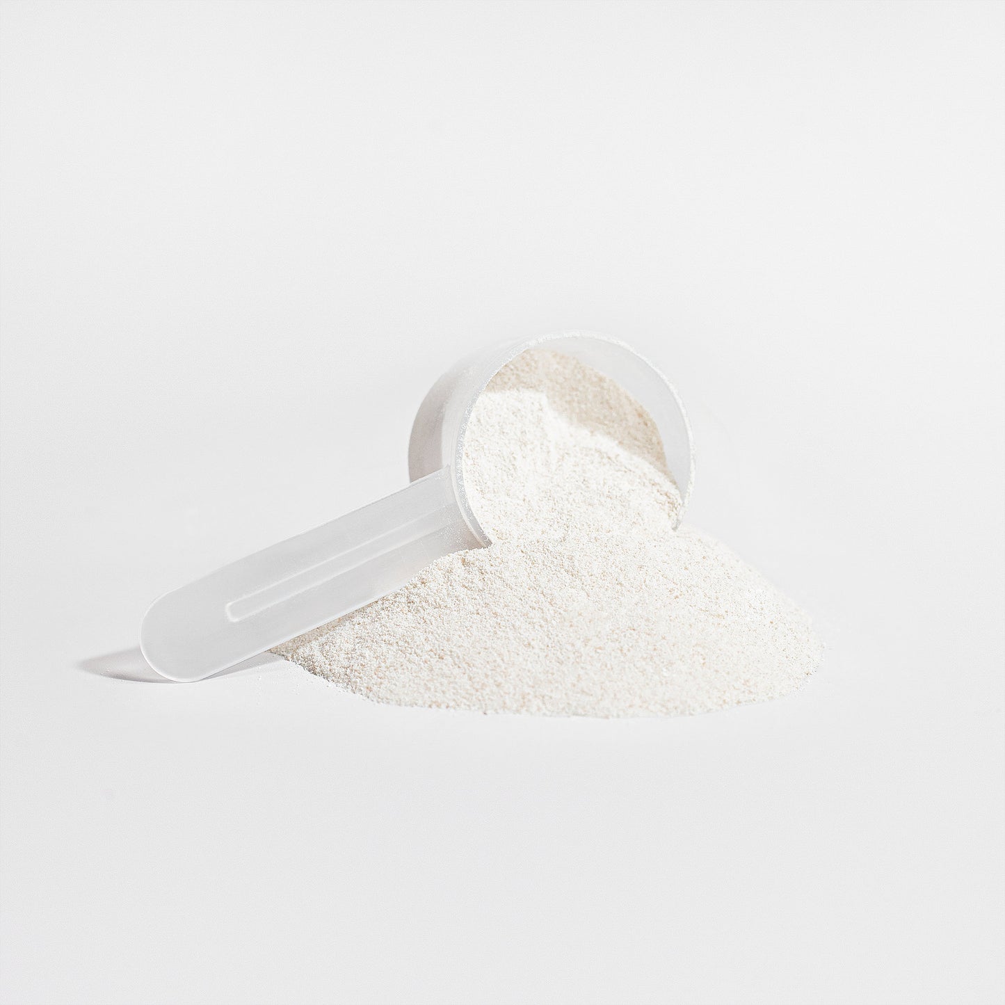 Fascia Fuel collagen peptides powder closeup with scoop by RMS Nutrition - grass-fed hydrolyzed collagen supplement