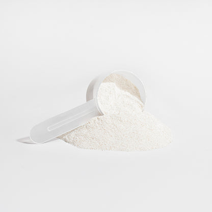 Fascia Fuel collagen peptides powder closeup with scoop by RMS Nutrition - grass-fed hydrolyzed collagen supplement